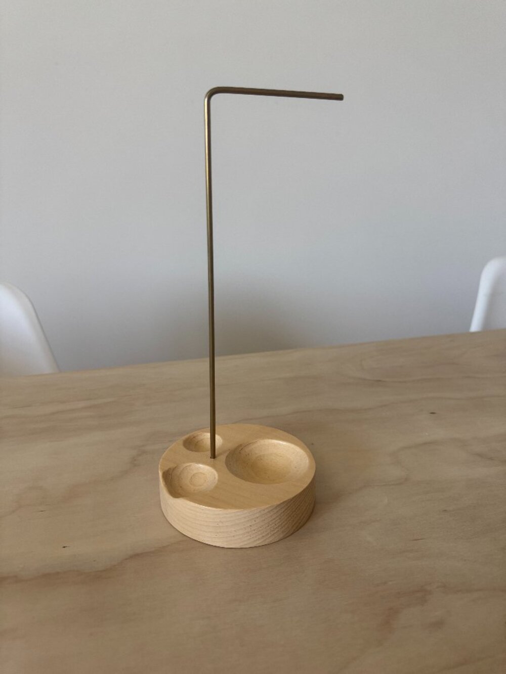 Minimalist wood and brass jewelry stand with ring holder